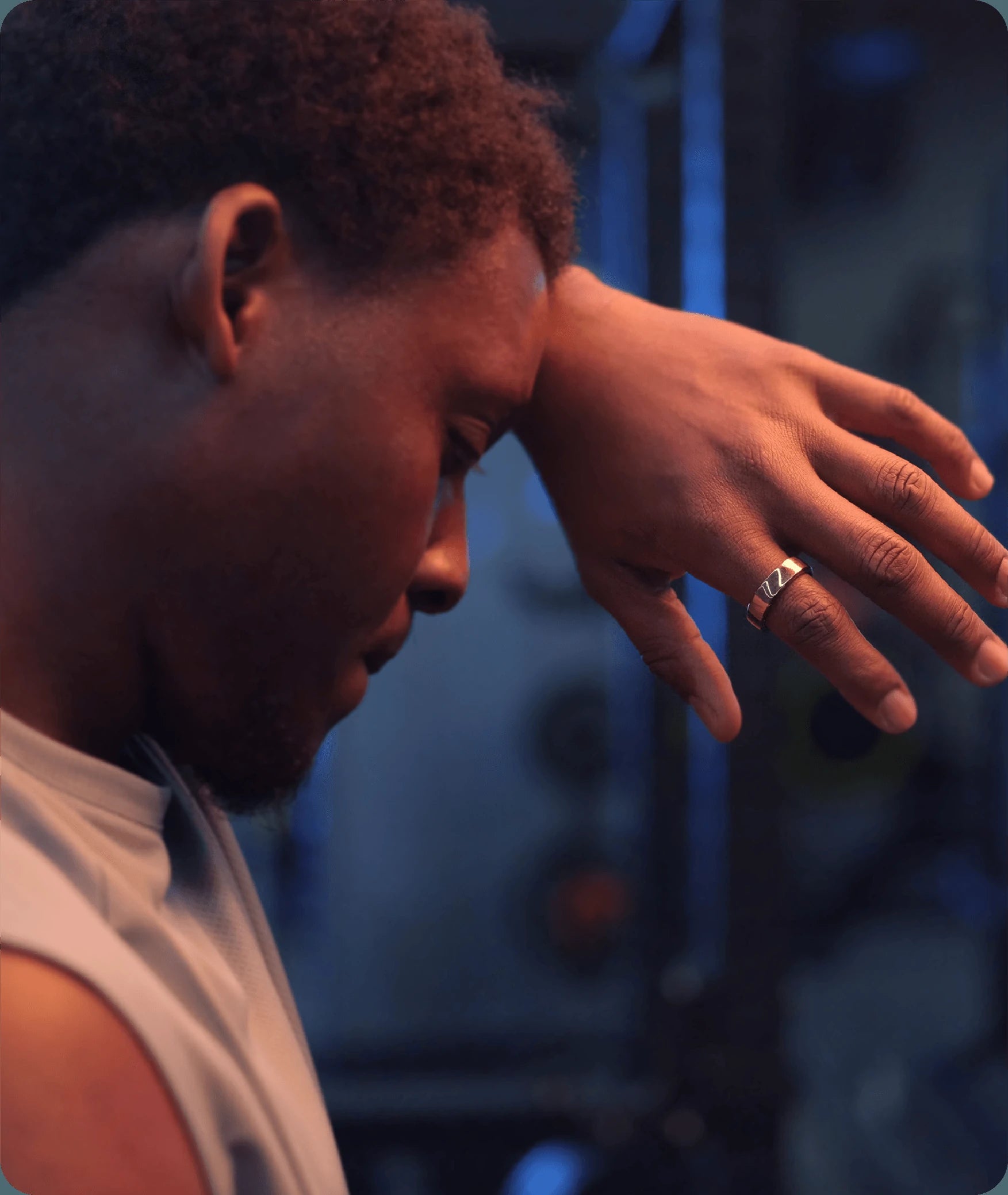Man wearing smart ring, showing sleek design, perfect for health tracking.