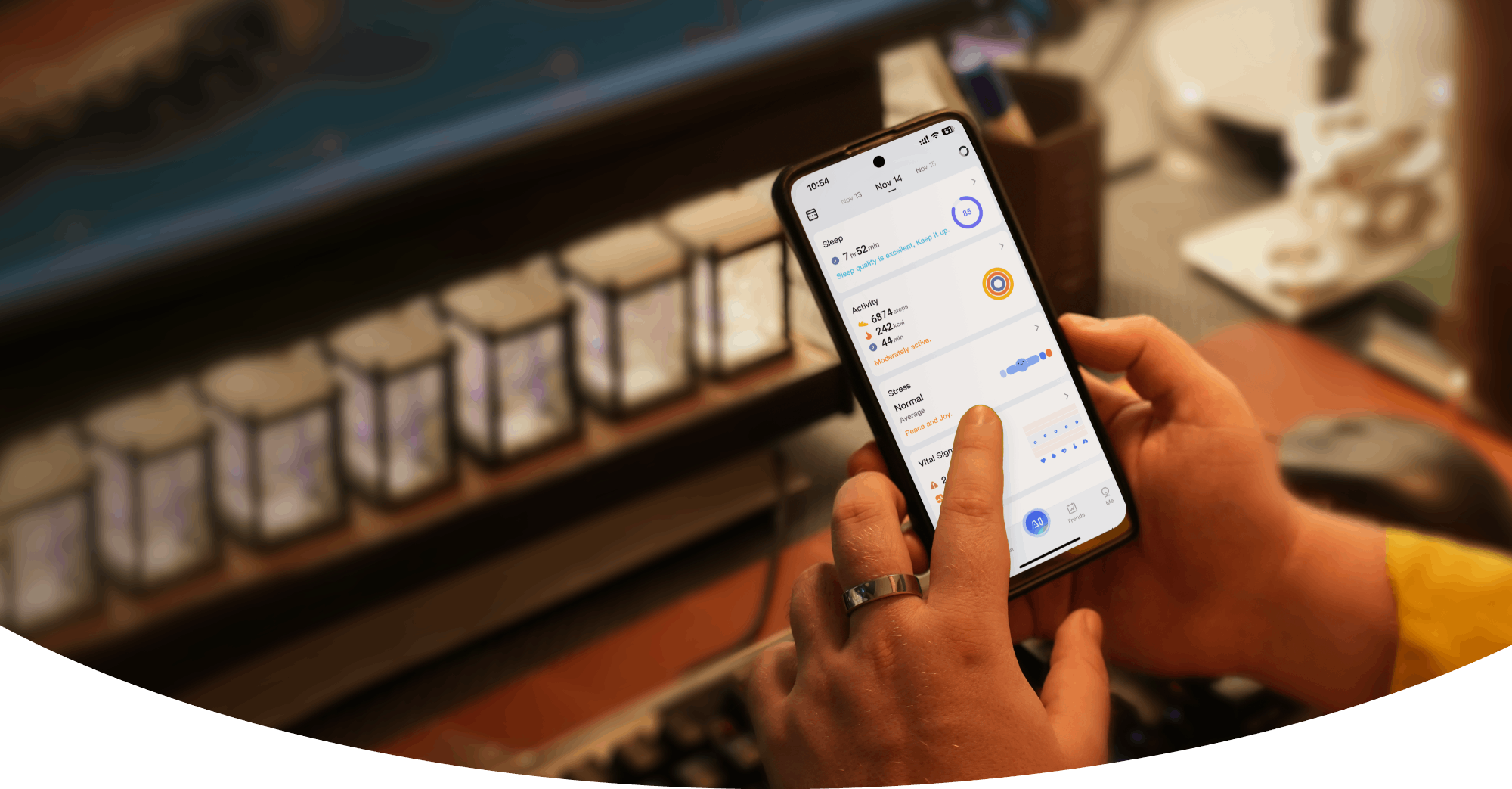 Smart ring health data displayed on a smartphone showing sleep quality, activity, and stress levels.